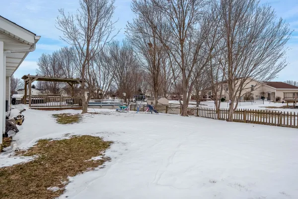 a view of swimming pool with a yard