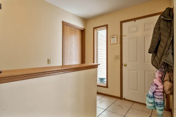 a view of game room with window and couch