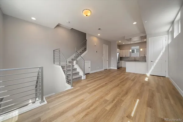 a view of a kitchen with a sink