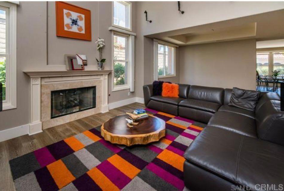 1317 Caminito Balada La Jolla, CA 92037 - Photo 5 of 16 a living room with furniture and a fireplace