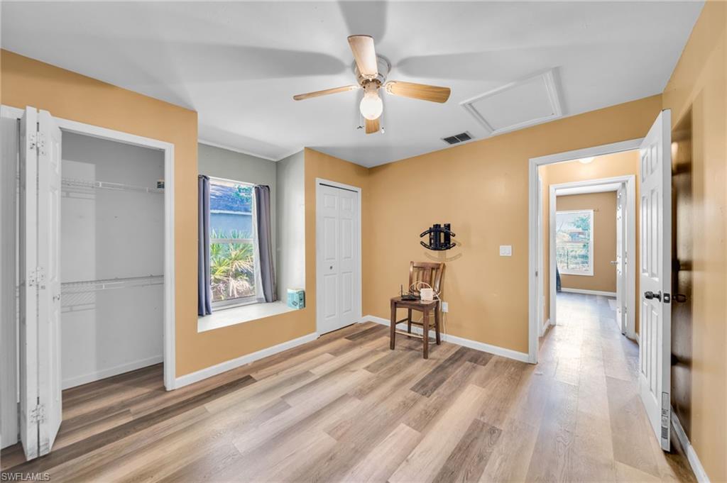18249 Linden Road Fort Myers, FL 33967 - Photo 8 of 17 Guest Bedroom with hall to guest bathroom