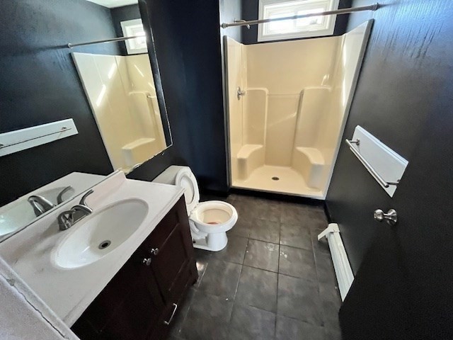 399 Main Street Oxford, MA 01540 - Photo 14 of 28 a bathroom with a sink vanity and mirror