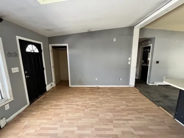 a view of an empty room and window