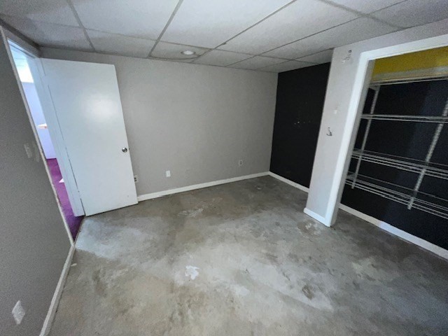 399 Main Street Oxford, MA 01540 - Photo 21 of 28 a view of an empty room with a fireplace