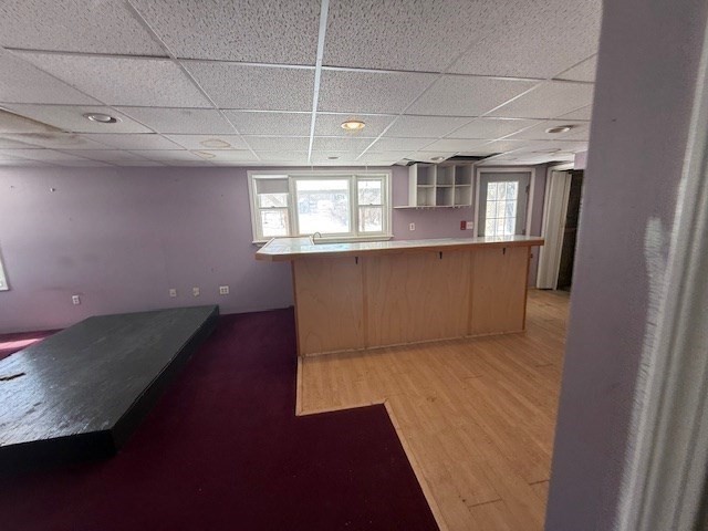 399 Main Street Oxford, MA 01540 - Photo 25 of 28 a view of a kitchen with wooden floor and staircase