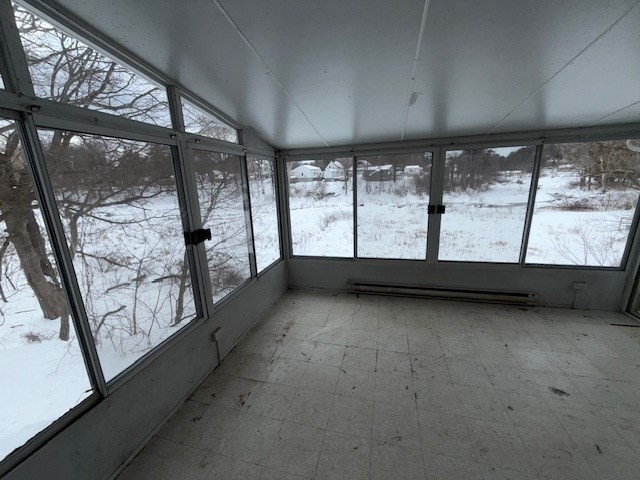 399 Main Street Oxford, MA 01540 - Photo 27 of 28 a view of an empty room with large windows