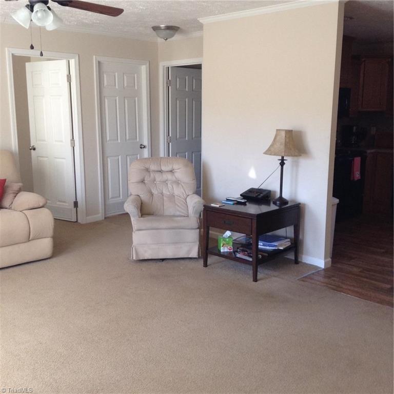 2716 Prison Camp Road Dobson, NC 27017 - Photo 21 of 21 Living room looking towards 2 other bedrooms & bathroom