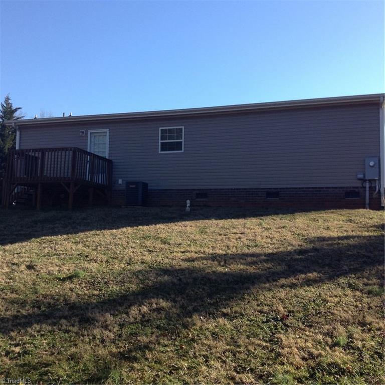 2716 Prison Camp Road Dobson, NC 27017 - Photo 5 of 21 Back view of house