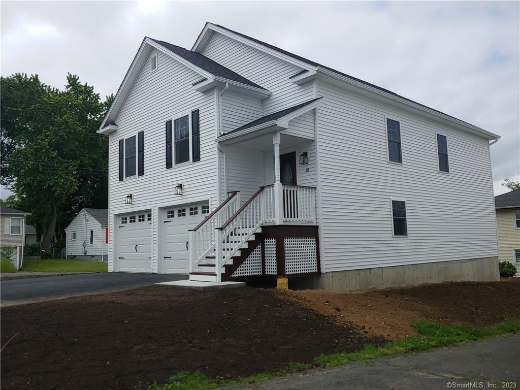 18 Anthony Terrace Waterbury, CT 06708 - Photo 1 of 1 a view of a white house with a yard