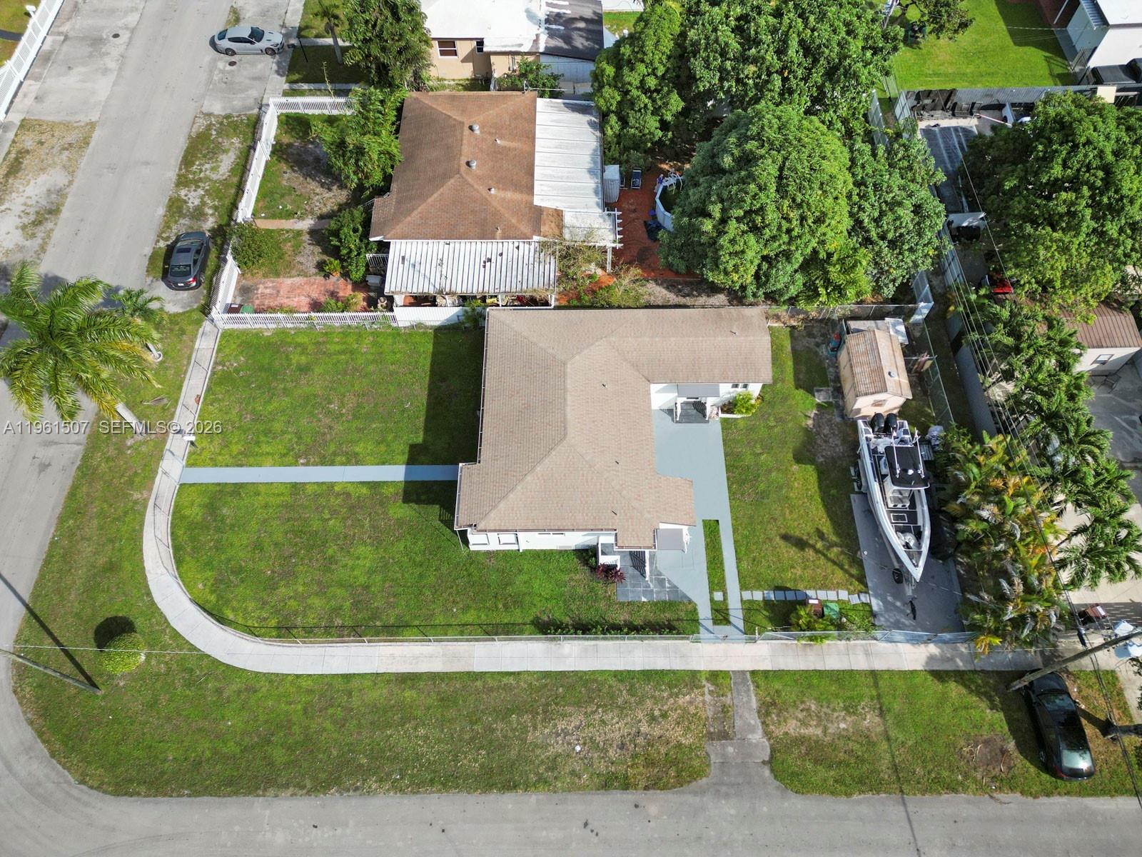 104 East 58th Street, Unit 1 Hialeah, FL 33013 - Photo 8 of 33 an aerial view of a house