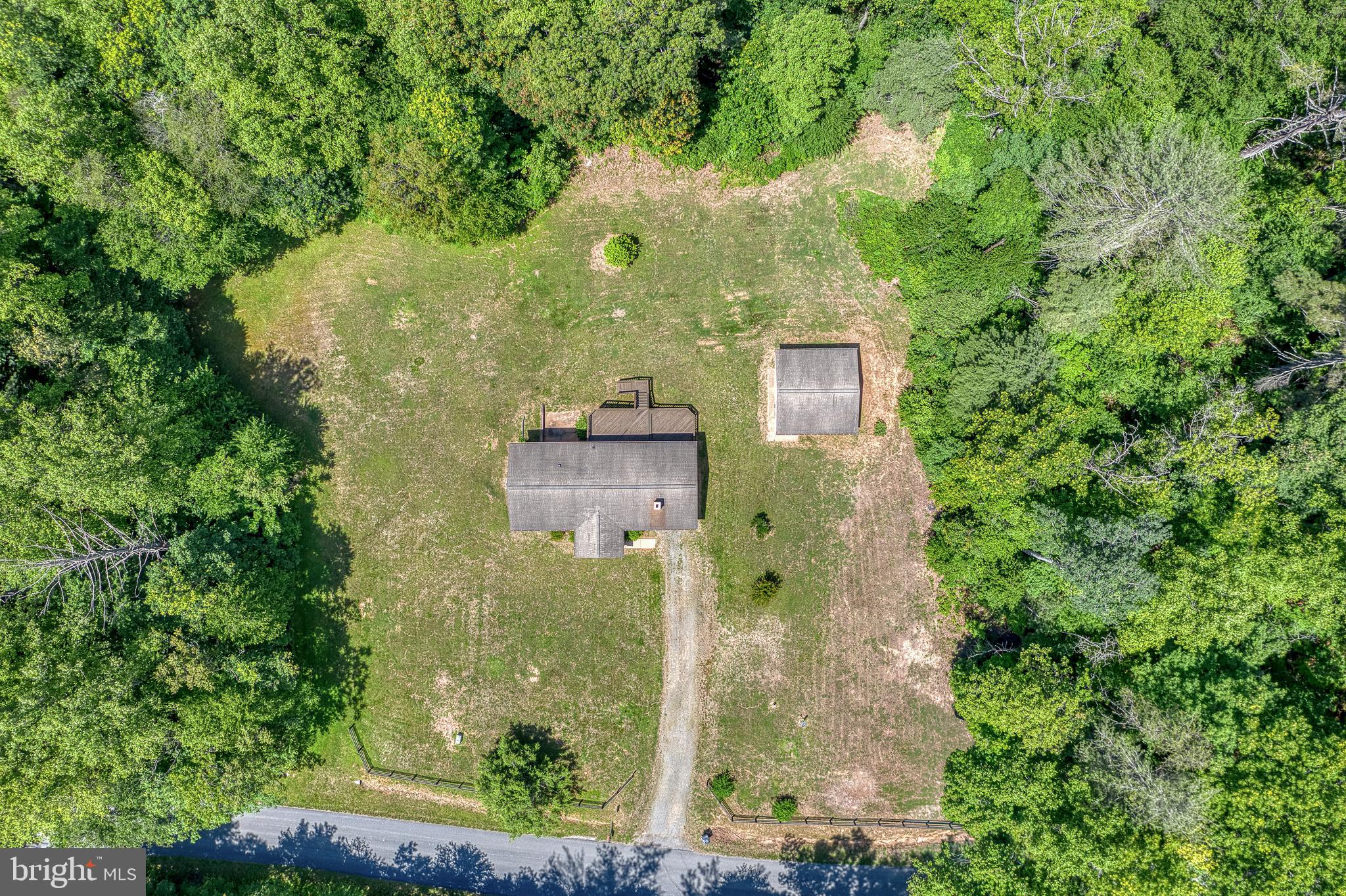 803 Weaver Hollow Road Banco, VA 22711 - Photo 66 of 67 an aerial view of a house with a yard