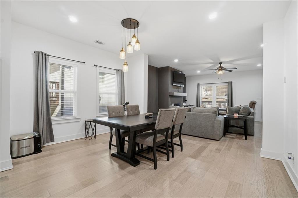 2281 Pryor Road Southwest Atlanta, GA 30315 - Photo 9 of 32 a view of a dining room with furniture and a chandelier