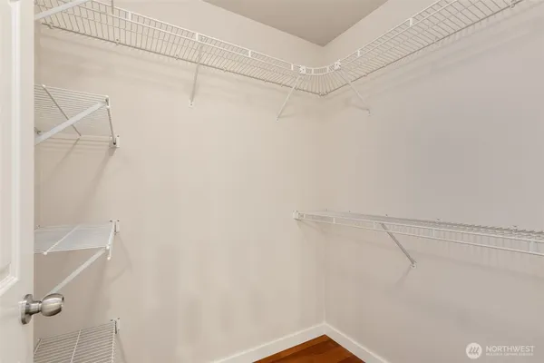 a view of a room with racks on the wall