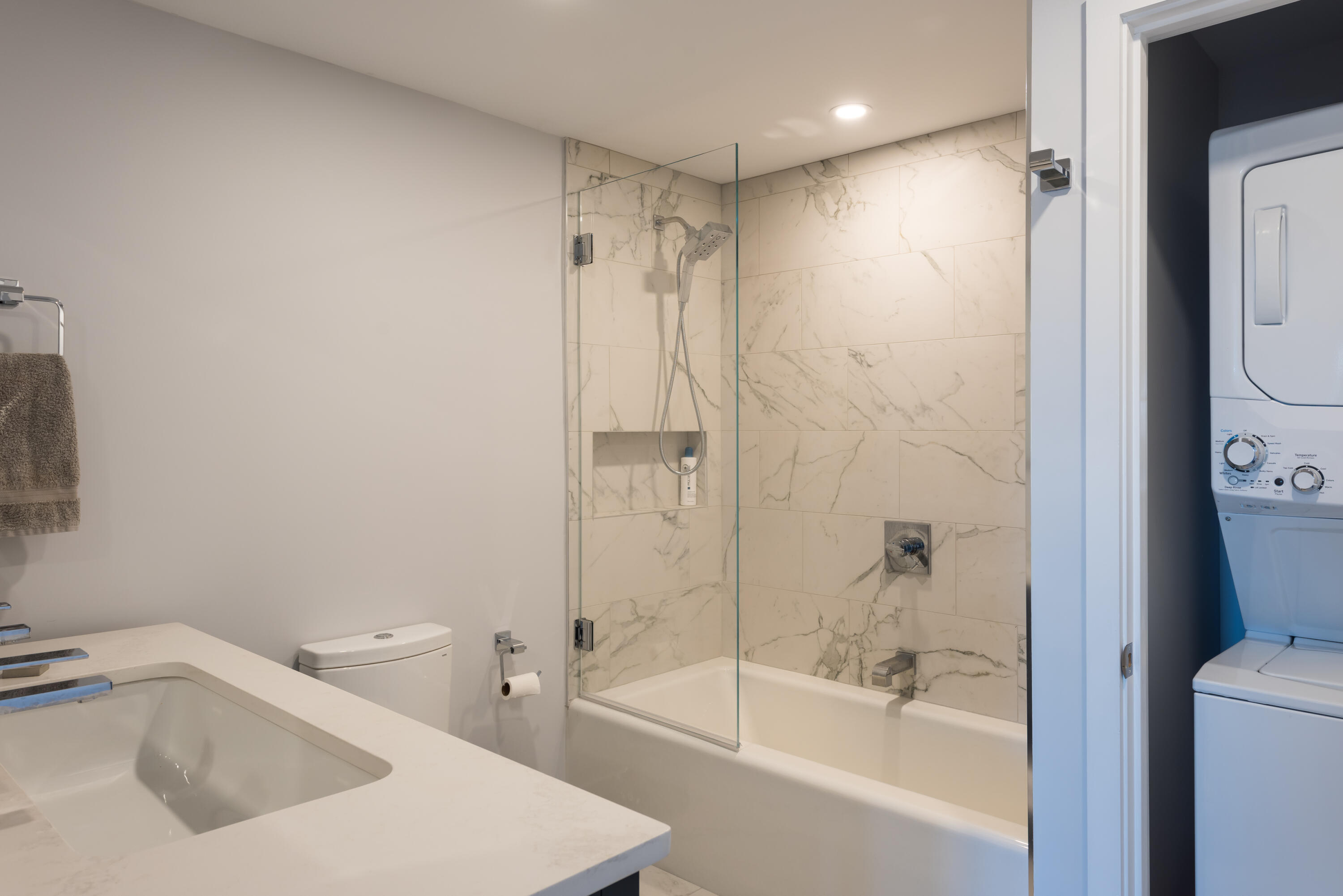 1 Belmont Road, Unit 225 West Harwich, MA 02671 - Photo 13 of 31 a bathroom with a tub a sink and a large mirror