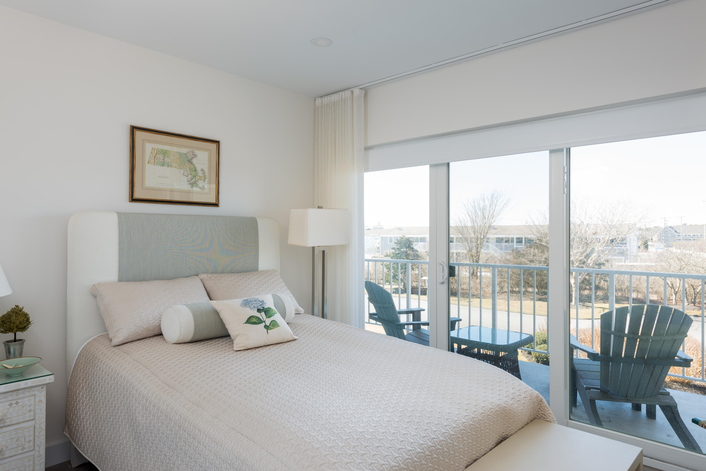 1 Belmont Road, Unit 225 West Harwich, MA 02671 - Photo 14 of 31 a bedroom with a large bed and a large window