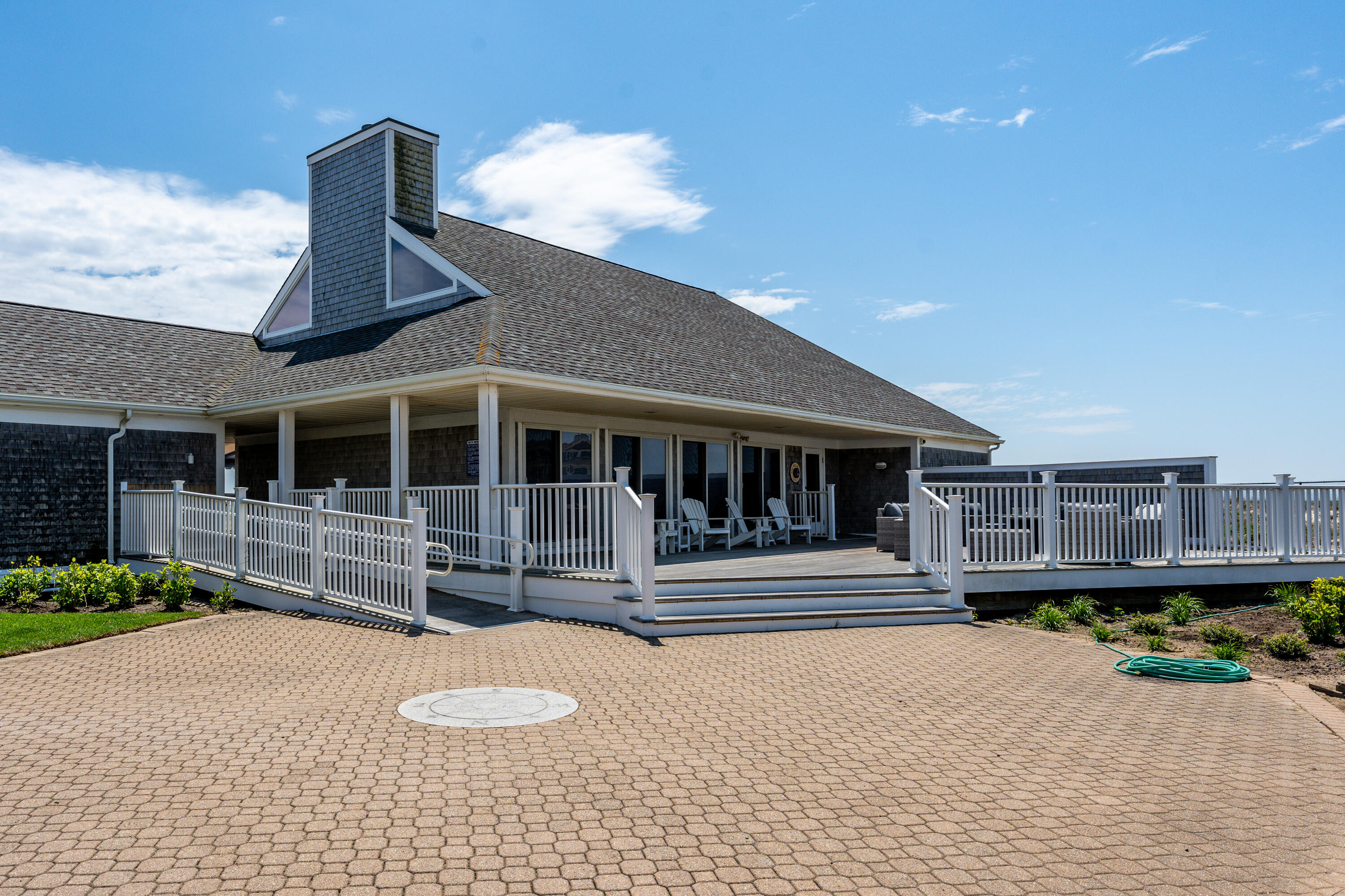 1 Belmont Road, Unit 225 West Harwich, MA 02671 - Photo 18 of 31 a front view of a house with a yard
