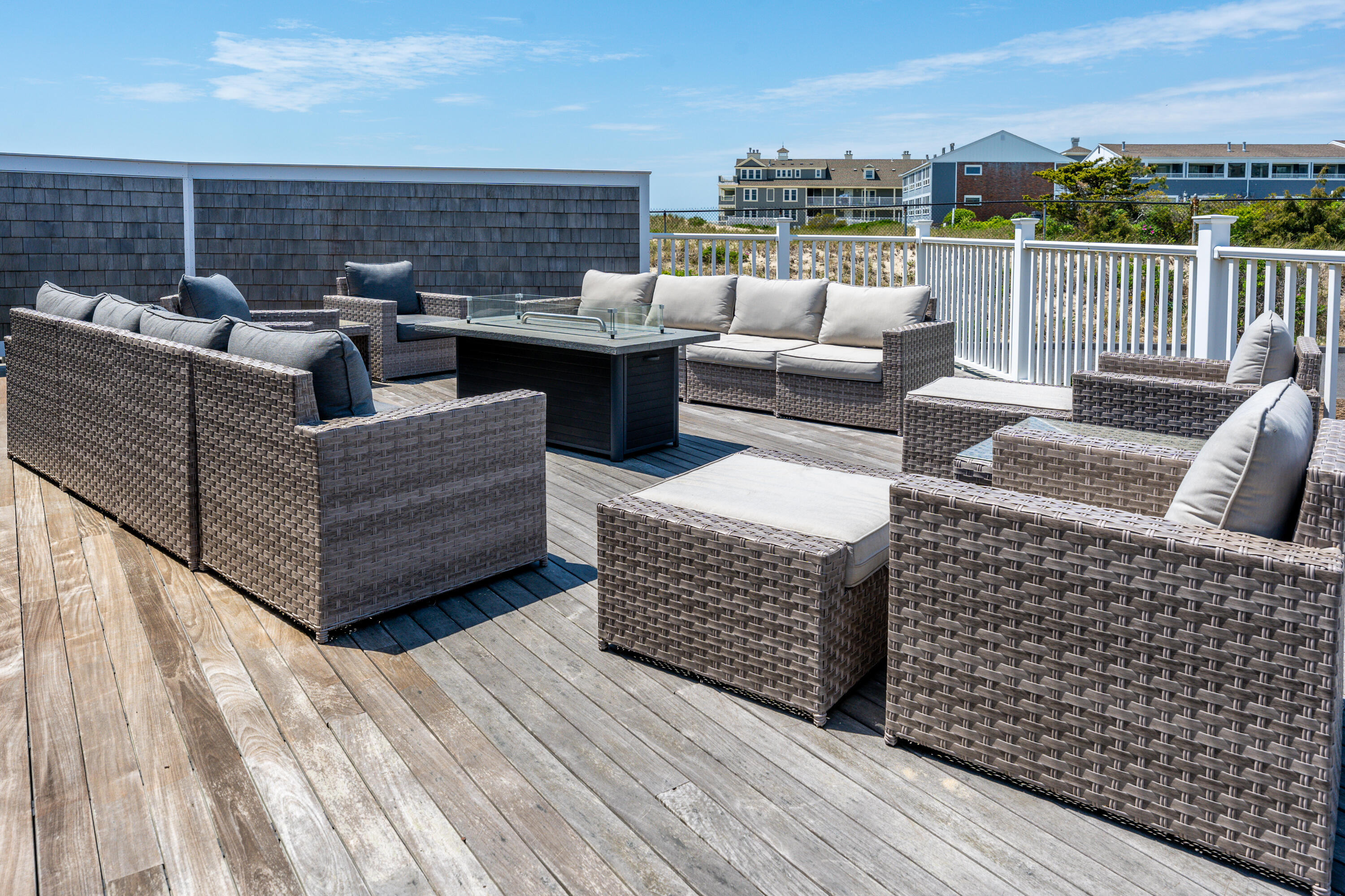 1 Belmont Road, Unit 225 West Harwich, MA 02671 - Photo 19 of 31 a roof deck with couches and wooden floor