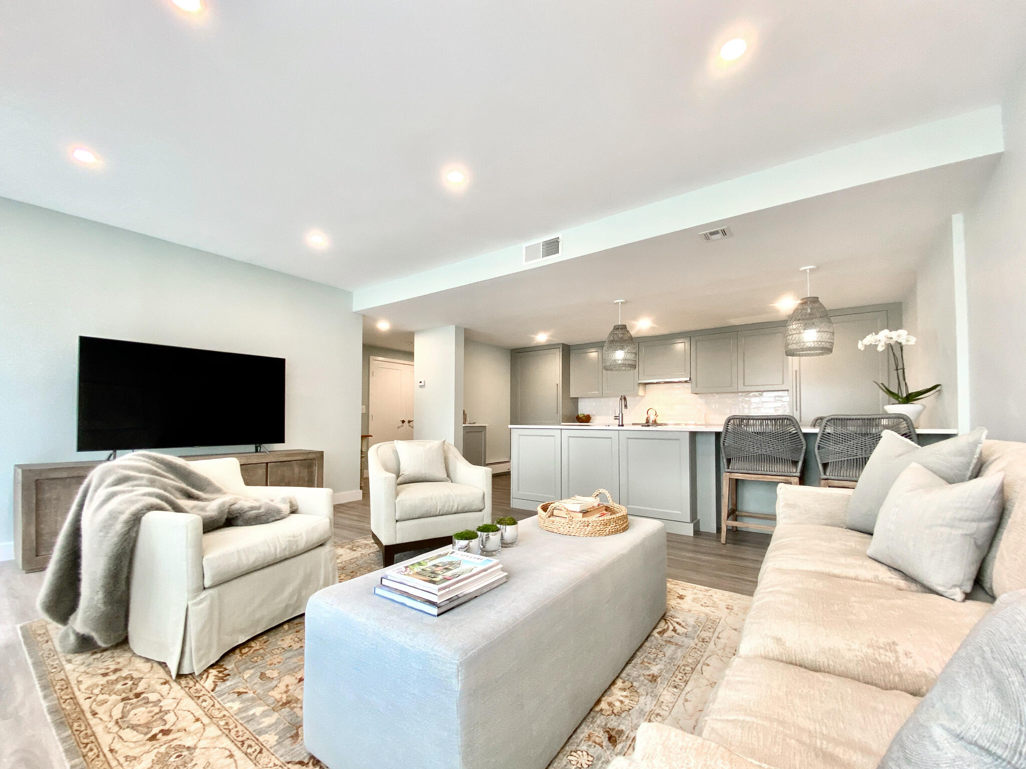1 Belmont Road, Unit 225 West Harwich, MA 02671 - Photo 2 of 31 a living room with furniture and a flat screen tv