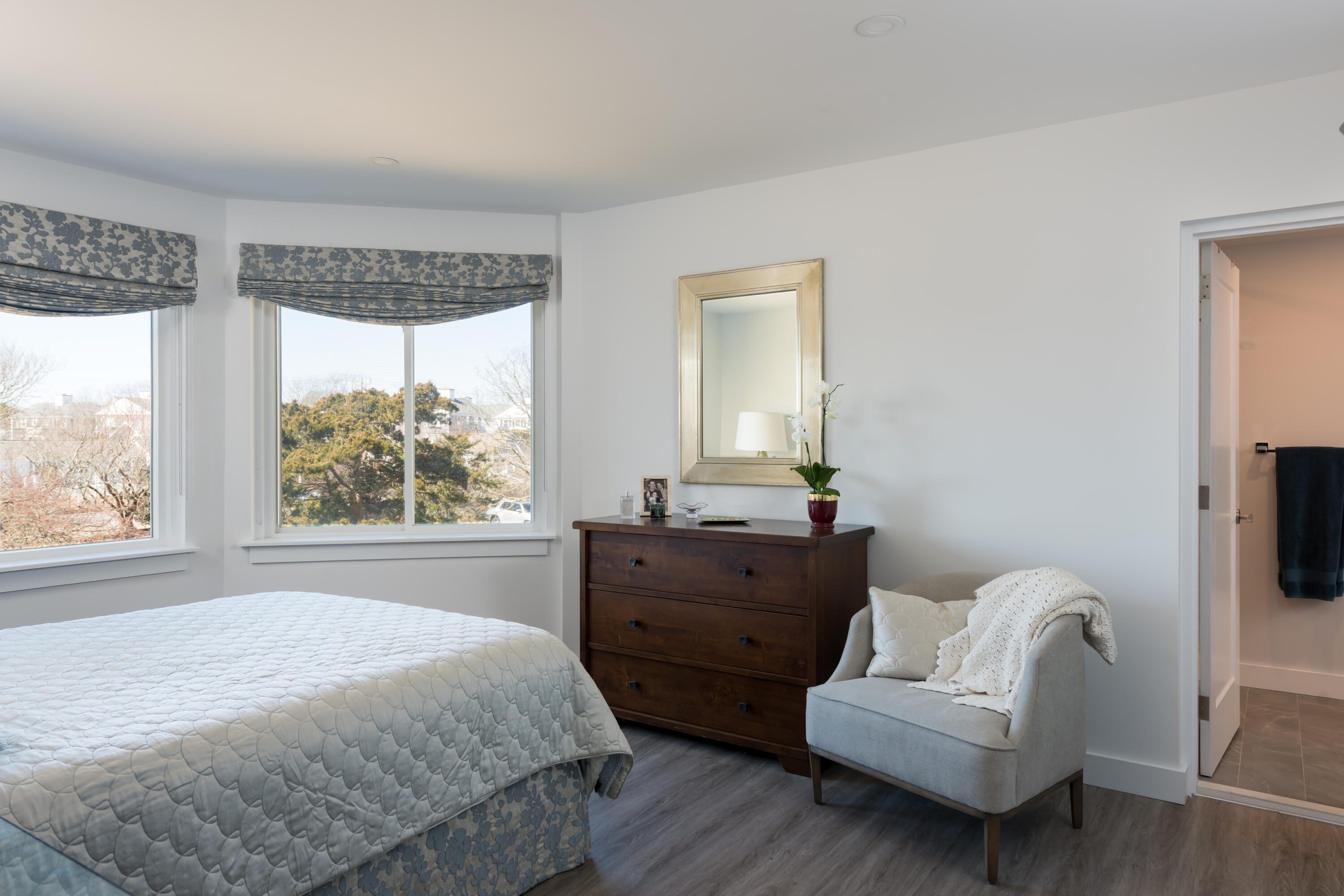 1 Belmont Road, Unit 225 West Harwich, MA 02671 - Photo 9 of 31 a spacious bedroom with a bed and a couch