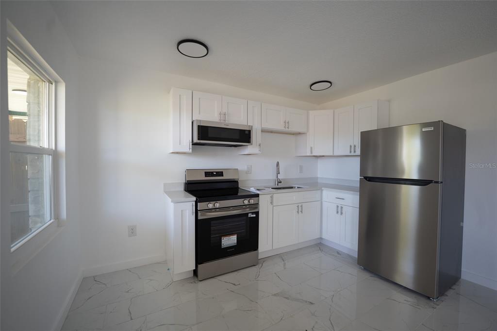 56 B Street, Unit 3 Madeira Beach, FL 33708 - Photo 2 of 9 Gallery Image 2