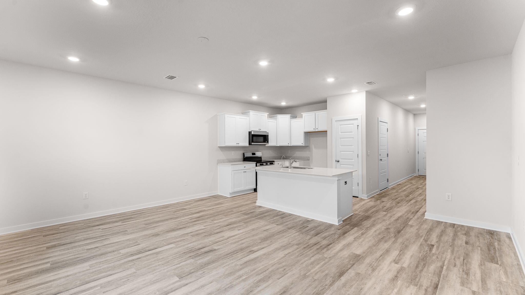 34 Rudder Lane Freeport, FL 32439 - Photo 5 of 32 a view of kitchen with wooden floor