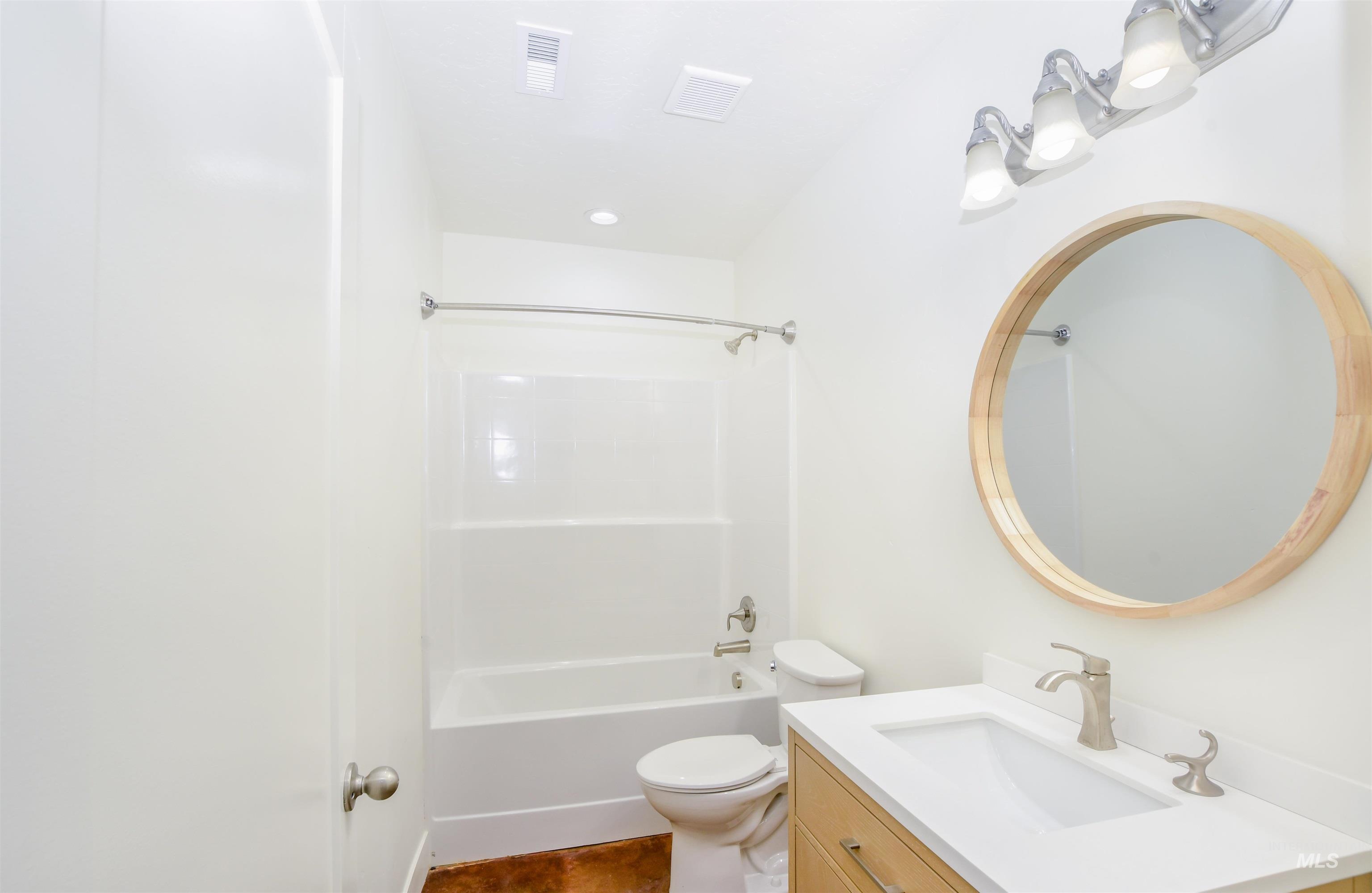 8481 Big Foot Road Melba, ID 83641 - Photo 26 of 41 Bathroom with bathing tub / shower combination, vanity, dark tile patterned floors, and recessed lighting