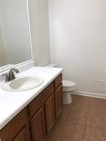 a bathroom with a sink and a toilet