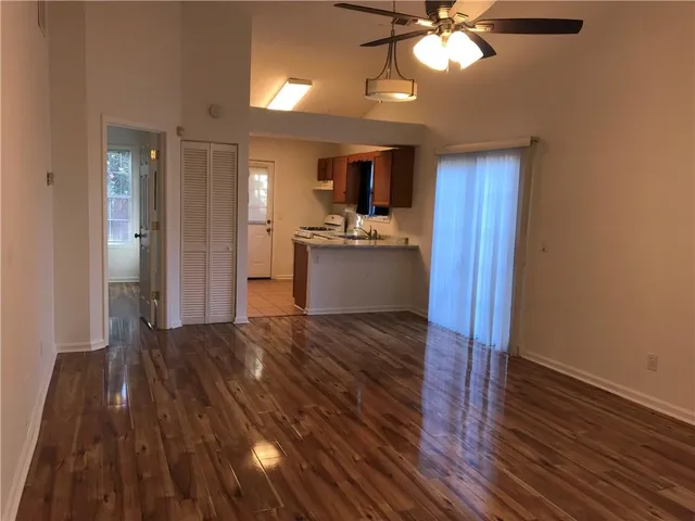 a view of a kitchen from the hallway