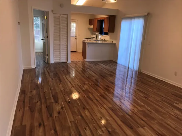 a view of a kitchen from the hallway