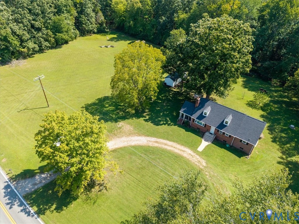 3577 Old Buckingham Road Powhatan, VA 23139 - Photo 13 of 36 Single-story brick residence with a dark shingle r