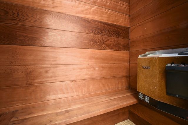 345 Olmsted Road Riverside, IL 60546 - Photo 13 of 31 a bathroom with a walk in closet