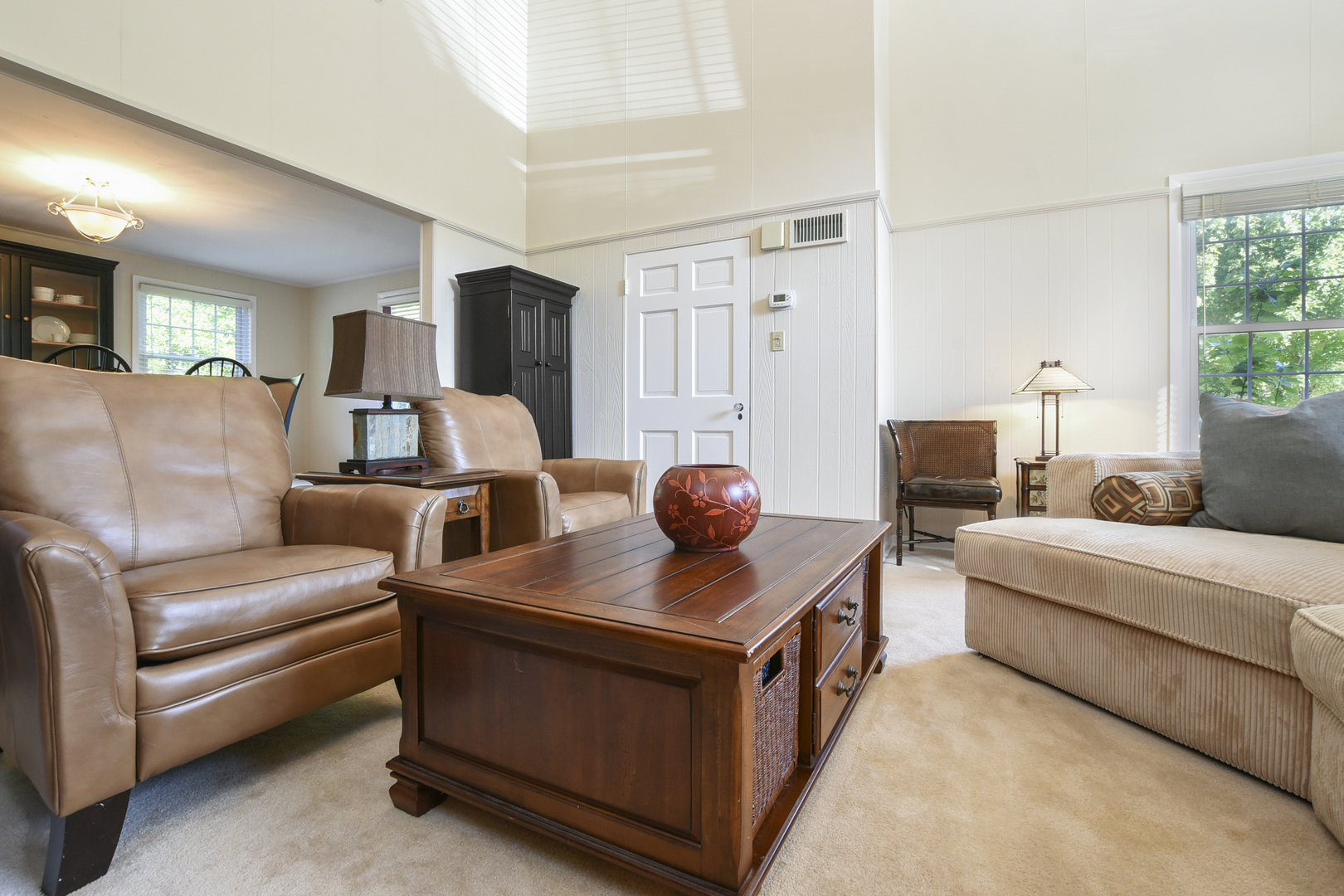 345 Olmsted Road Riverside, IL 60546 - Photo 5 of 31 a living room with furniture and a flat screen tv