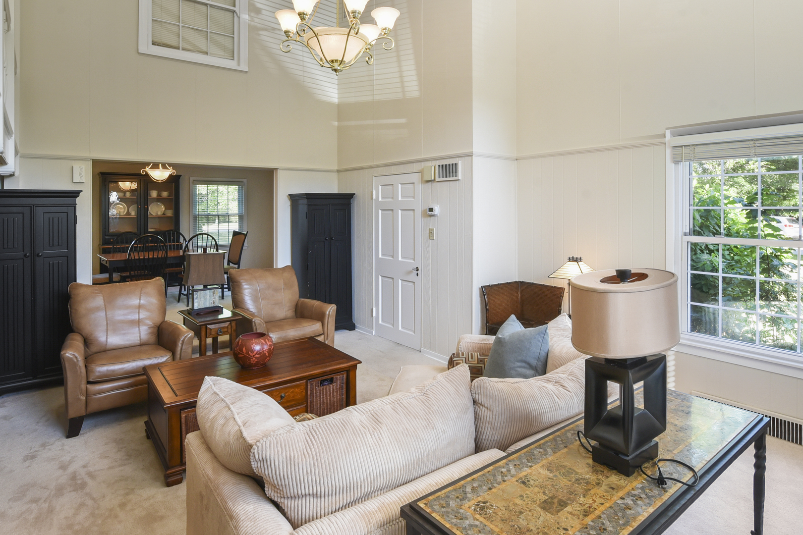 345 Olmsted Road Riverside, IL 60546 - Photo 6 of 31 a living room with furniture and a large window