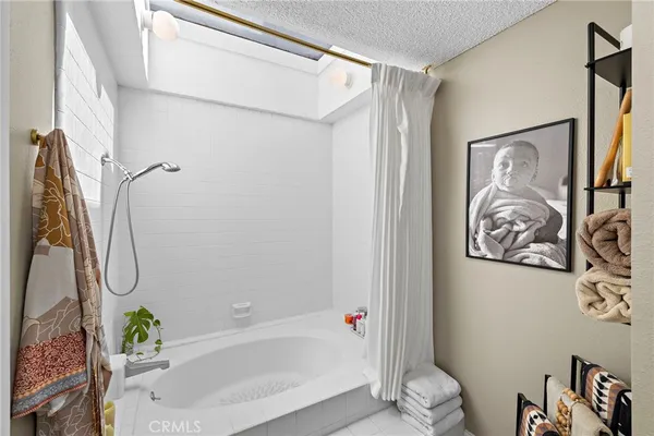 a bathroom with a sink double vanity and a mirror