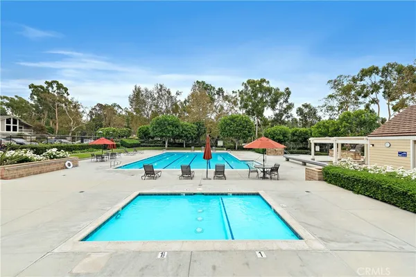 a view of a park with swings and slides