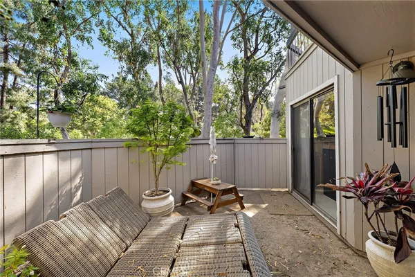 a view of backyard with a patio and furniture