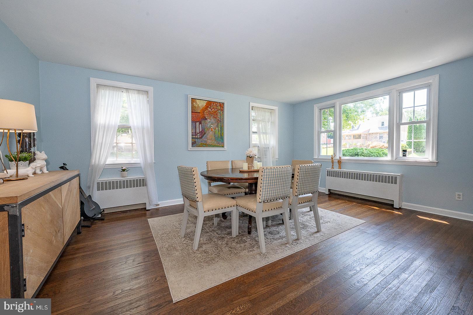 135 Sherman Road Springfield, PA 19064 - Photo 3 of 32 a view of a dining room with furniture window and wooden floor