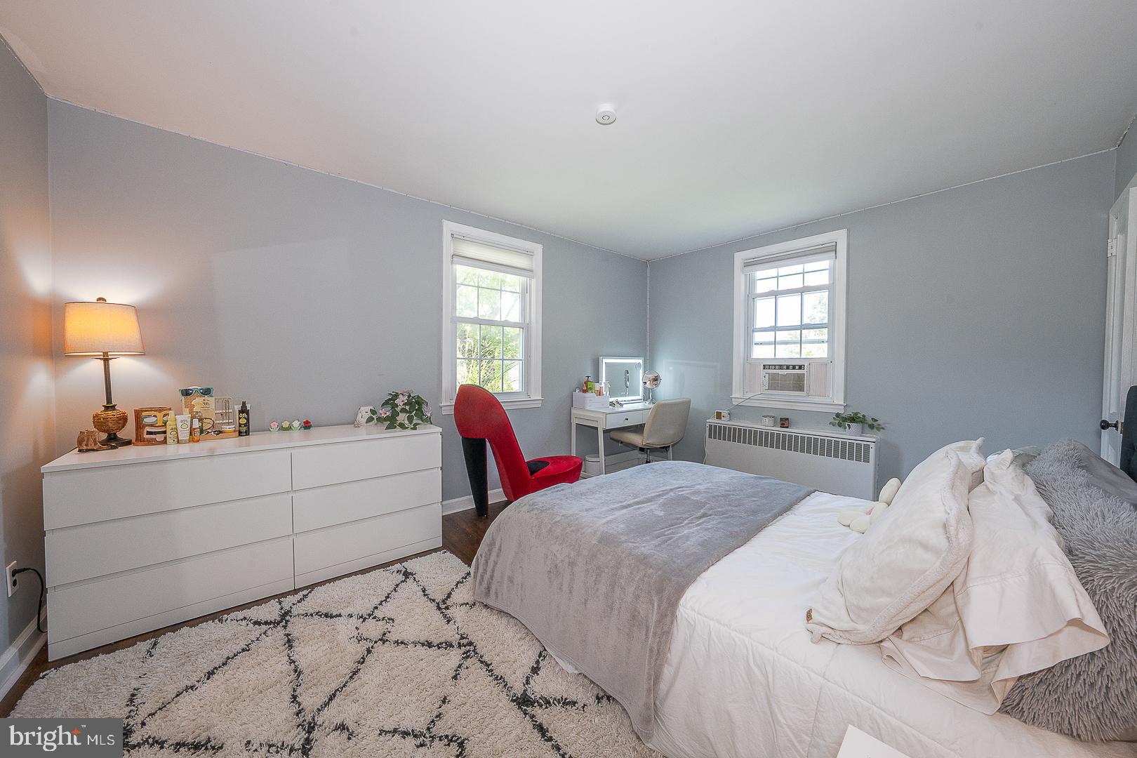135 Sherman Road Springfield, PA 19064 - Photo 4 of 32 a room with a bed and a window