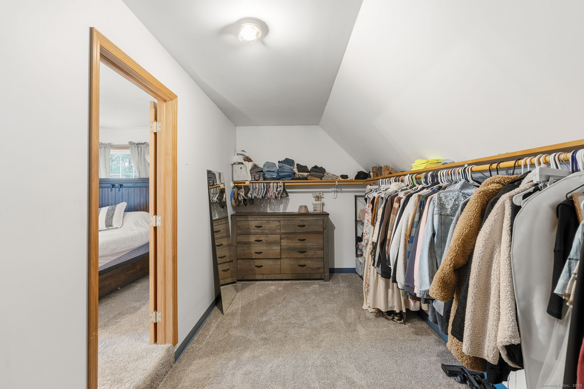 87 South Brook Road Hampton, CT 06247 - Photo 19 of 35 a view of walk in closet with clothes and shoes