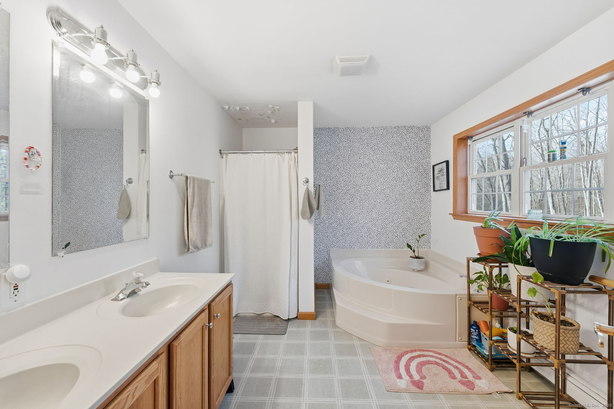 87 South Brook Road Hampton, CT 06247 - Photo 20 of 35 a bathroom with a tub sink and mirror