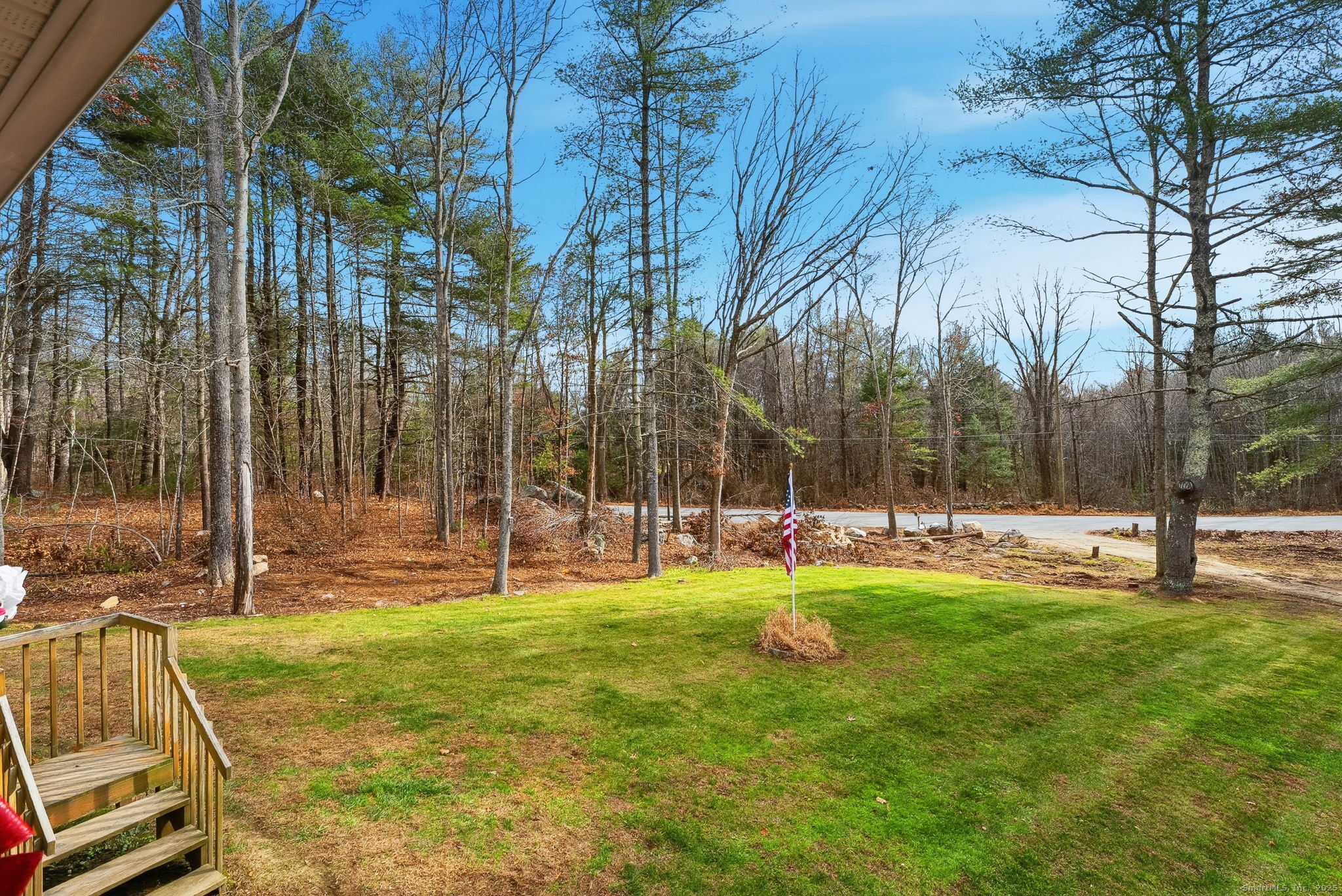 87 South Brook Road Hampton, CT 06247 - Photo 29 of 35 a view of a backyard with a slide and large trees