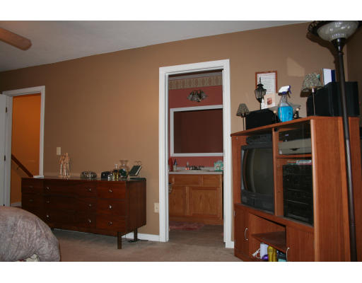 19 Highfield Road, Unit B Charlton, MA 01507 - Photo 20 of 28 a kitchen view of a refrigerator stove and a sink