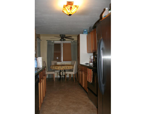 19 Highfield Road, Unit B Charlton, MA 01507 - Photo 10 of 28 a view of a hallway with a table and chairs