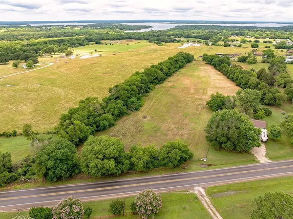 a view of an ocean and a mountain