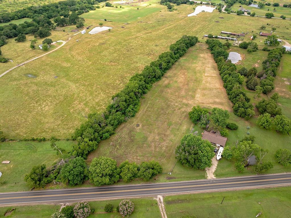 0 North Washington Street Pilot Point, TX 76258 - Photo 8 of 14 a view of swimming pool with an ocean view