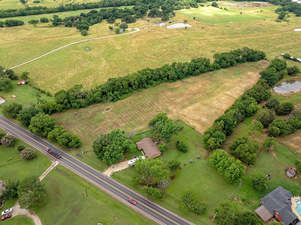 0 North Washington Street Pilot Point, TX 76258 - Photo 9 of 14 a view of a yard with an outdoor space