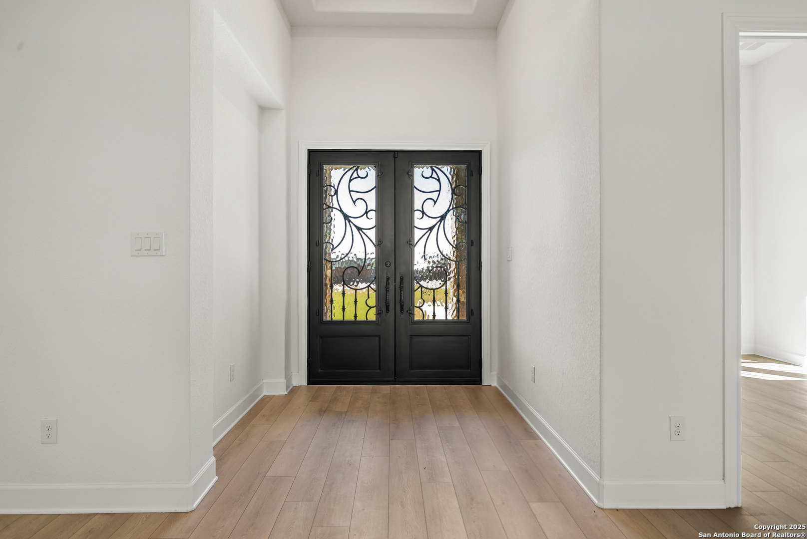 241 Stone Loop Castroville, TX 78009 - Photo 2 of 23 a view of empty room with windows