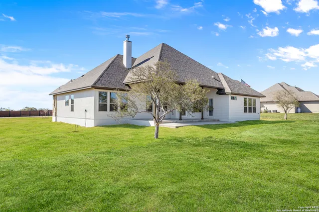 a house view with a garden space