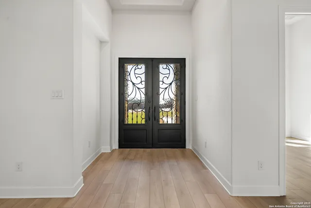 a view of empty room with windows