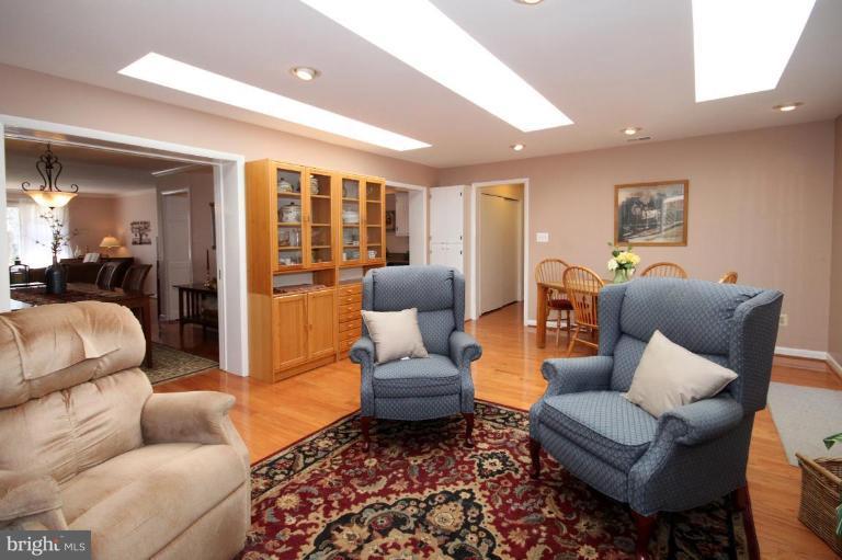 5631 Inverchapel Road Springfield, VA 22151 - Photo 22 of 30 a living room with furniture and a large window
